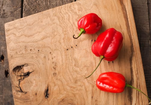Hot and spicy Habanero chili on rustic wood