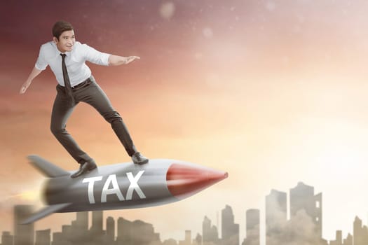 Happy asian businessman flying on rocket with Tax text. Taxation concept