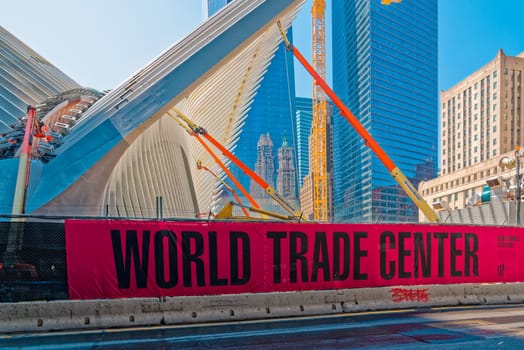 New York, USA - June 08, 2015: Ground Zero with the World Trade Center One and Transportation building late in the day in Lower Manhattan.