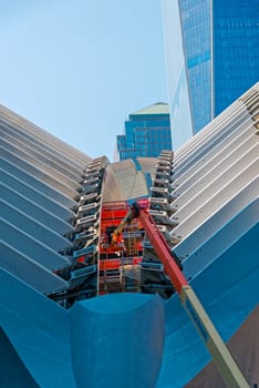 New York, USA - June 08, 2015: Ground Zero with the World Trade Center One and Transportation building late in the day in Lower Manhattan.