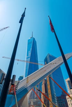 New York, USA - June 08, 2015: Ground Zero with the World Trade Center One and Transportation building late in the day in Lower Manhattan.