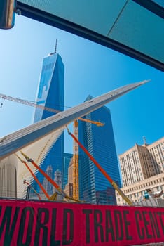 New York, USA - June 08, 2015: Ground Zero with the World Trade Center One and Transportation building late in the day in Lower Manhattan.