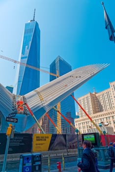 New York, USA - June 08, 2015: Ground Zero with the World Trade Center One and Transportation building late in the day in Lower Manhattan.