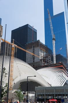 New York, USA - June 08, 2015: Ground Zero with the World Trade Center One and Transportation building late in the day in Lower Manhattan.