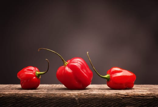 Hot and spicy Habanero chili on rustic wood