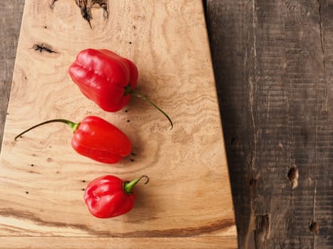 Hot and spicy Habanero chili on rustic wood