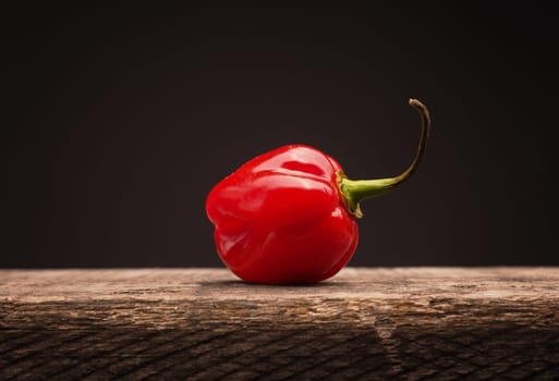 Hot and spicy Habanero chili on rustic wood