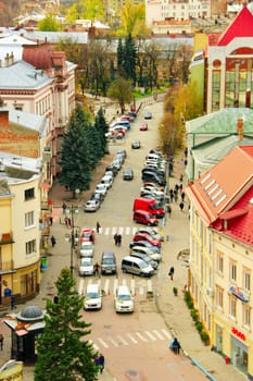view to Ivano-Frankivsk from a bird's eye view with cars parked on the street of the city
