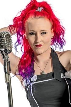 Rock'n'Roll singer with red hair and microphone
