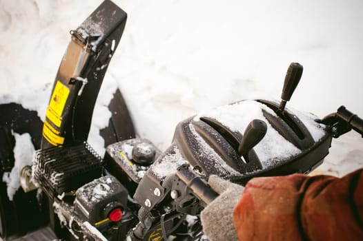 close up on snow blower for snow removal in winter