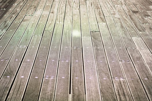 patterned wooden footpath secured with nails
