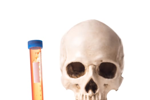 Blood sample or test tube with red liquid and blurry skull isolated in white background