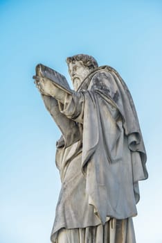 Rome, Italy - January 04, 2015: Particulars of a statue in San Pietro  square, Rome Italy