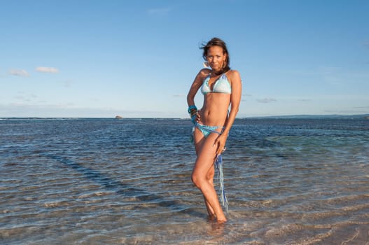 Beautiful and sexy girl posing at the beach in dominican republic dressing a bikini