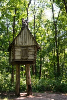 A nice wooden playhouse in an Ukrainian forest near Kharkiv