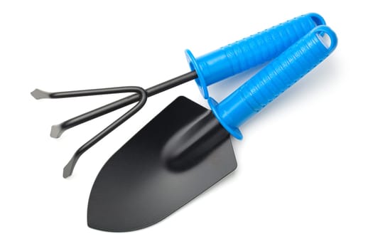 garden shovel and rake isolated on white background. top view