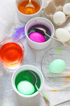 Coloring eggs for Easter, vertical view