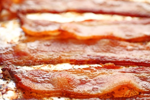 Oven-fried bacon on foil-lined pan