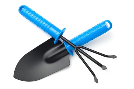 garden shovel and rake isolated on white background. top view