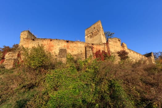 Medieval fortified saxon fortress in Saschiz village. Transylvania, Romania. It was built by the ethnic German Transylvanian Saxon community.