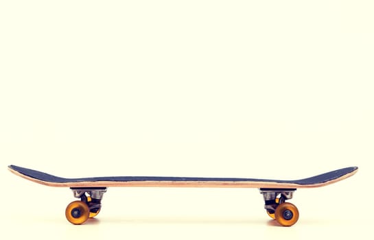 skateboard in front of bright background - horizontal