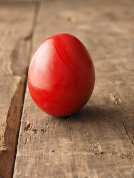 Easter egg on a rustic wooden table, Happy Easter background