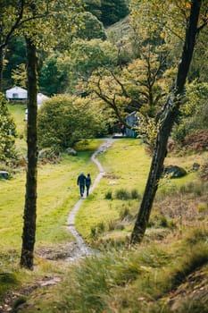Senior couple have returned back to their campsite after a long hike through the Lake District.