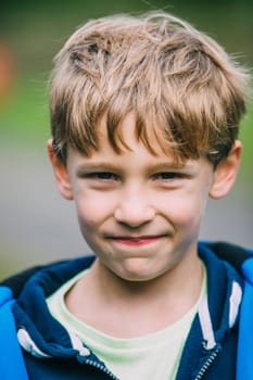 Portrait of a cute little boy while out hiking.