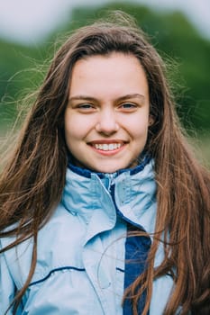 Portrait of a teenage girl while out hiking.