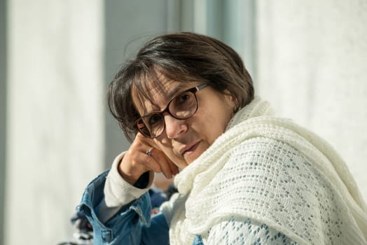 portrait of a middle-aged woman in the spring sun