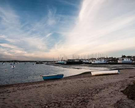 coastal boats beach sun set scene special nature background sky  essex  england  uk