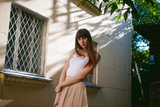Young beautiful woman walking around the street on a warm sunny summer day