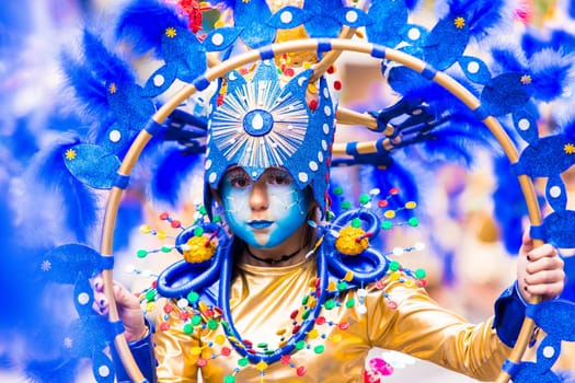 Badajoz, Spain, sunday. February.26. 2017 Participants in colorful costumes take part in the carnival parade in Badajoz 2017