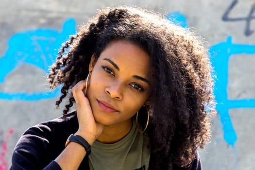 Portrait of an attractive African-American woman. Outdoor Shooting.