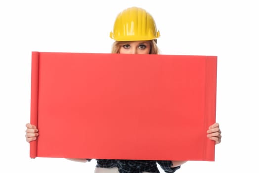 Construction worker holds up advertising poster