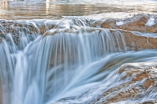 Golden light at Elbow Falls in Kananaskis Canada