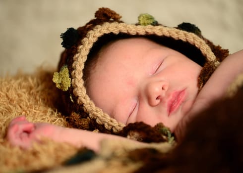 sleeping baby with cap