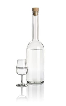 Liquor bottle and swivel filled with clear liquid