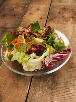 Fresh lettuce on a wooden table, healthy food or diet concept background