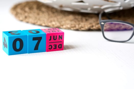 modern perpetual calendar composed of colored cubes and set at the date of June 7
