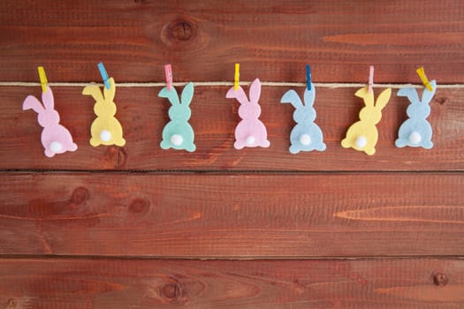 Colorful Easter decoration rustic background made of wood