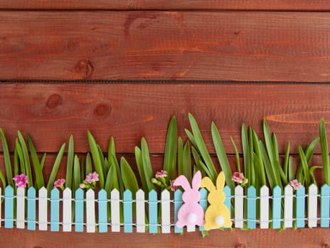 Colorful Easter decoration on a rustic wooden background