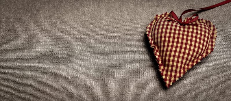 Hearts made of fabric as a romantic background