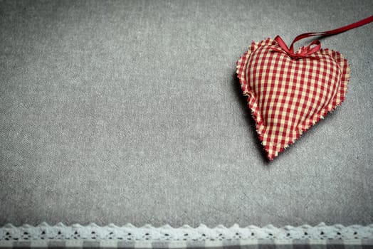 Hearts made of fabric as a romantic background