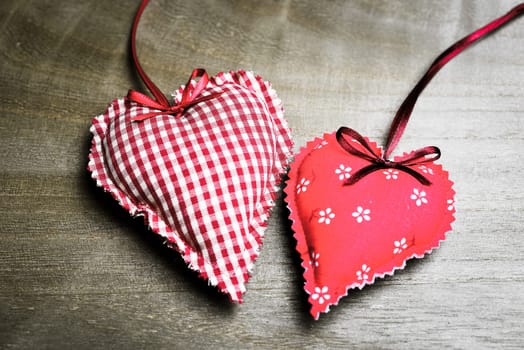 Hearts made of fabric as a romantic background