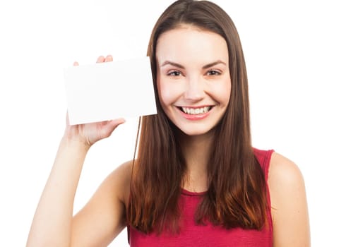 Young brunette displaying a blank business card, isolated on white