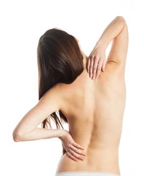 Young woman feeling pain on her back, isolated on white