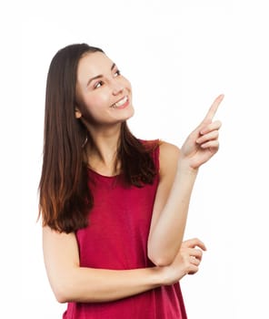 Cheerful woman pointing at copy space, isolated on white