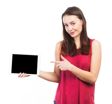 Young woman holding and showing the blank screen of an electronic tablet, isolated on white