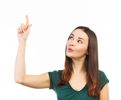 Cheerful woman pointing up at copy space, isolated on white